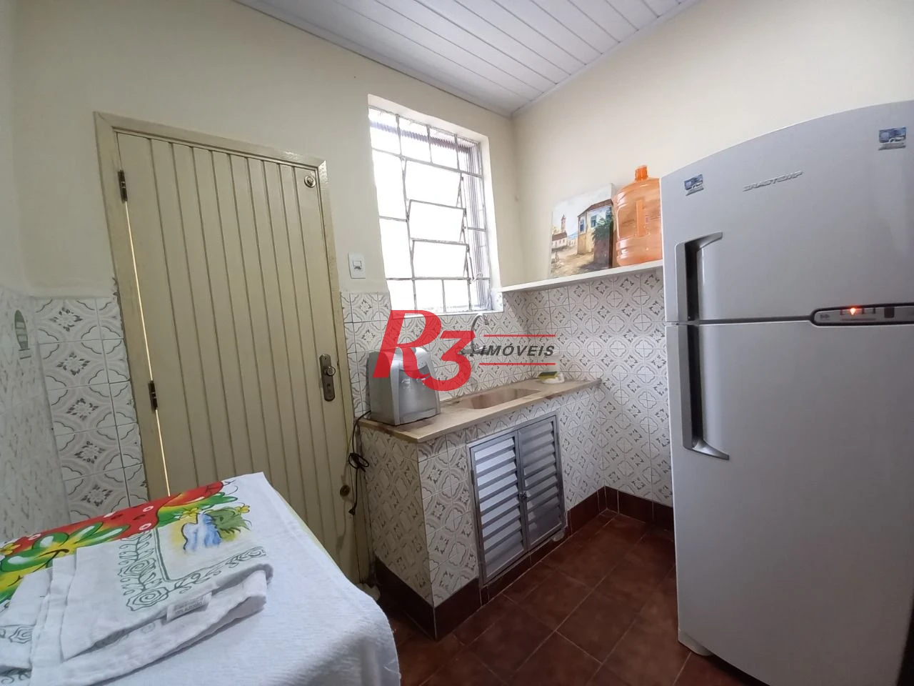 Casa com 3 dormitórios à venda, 98 m² por R$ 700.000,00 - Centro - São Vicente/SP