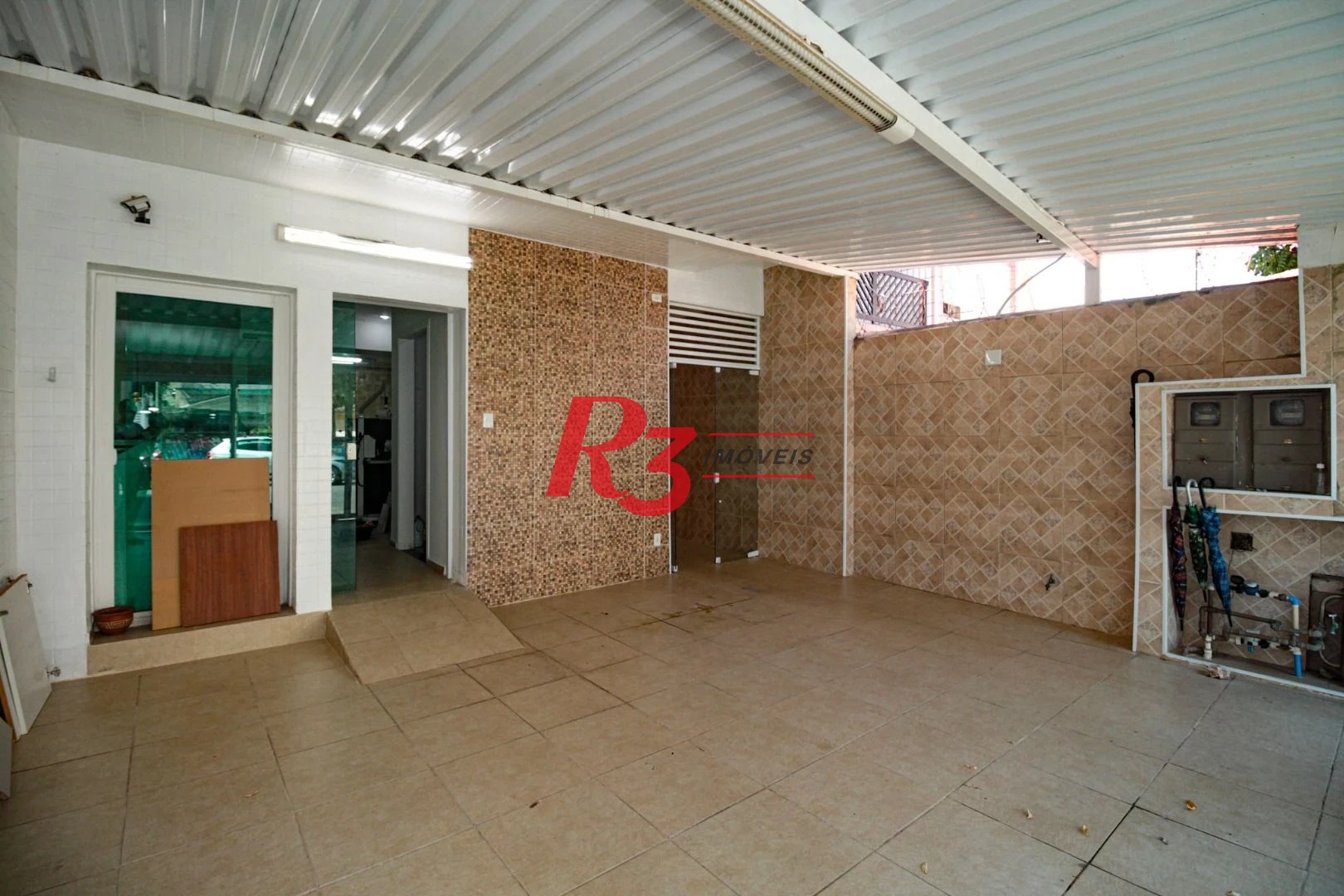Sobrado com 3 dormitórios à venda, 220 m² por R$ 1.200.000,00 - Encruzilhada - Santos/SP