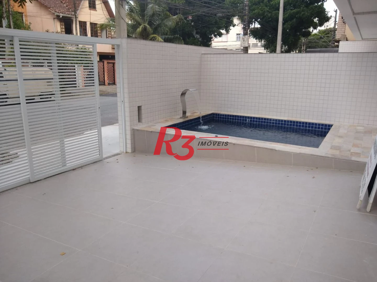 Sobrado com 3 dormitórios à venda, 100 m² por R$ 1.050.000,00 - Embaré - Santos/SP