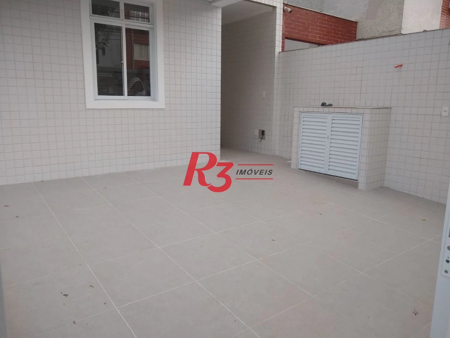 Sobrado com 3 dormitórios à venda, 100 m² por R$ 1.050.000,00 - Embaré - Santos/SP