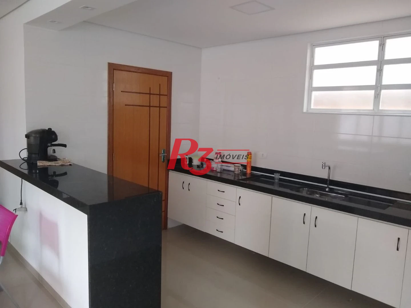 Sobrado com 3 dormitórios à venda, 100 m² por R$ 1.050.000,00 - Embaré - Santos/SP