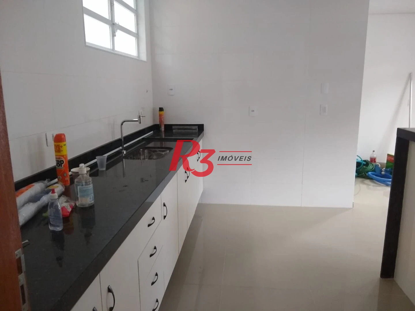 Sobrado com 3 dormitórios à venda, 100 m² por R$ 1.050.000,00 - Embaré - Santos/SP