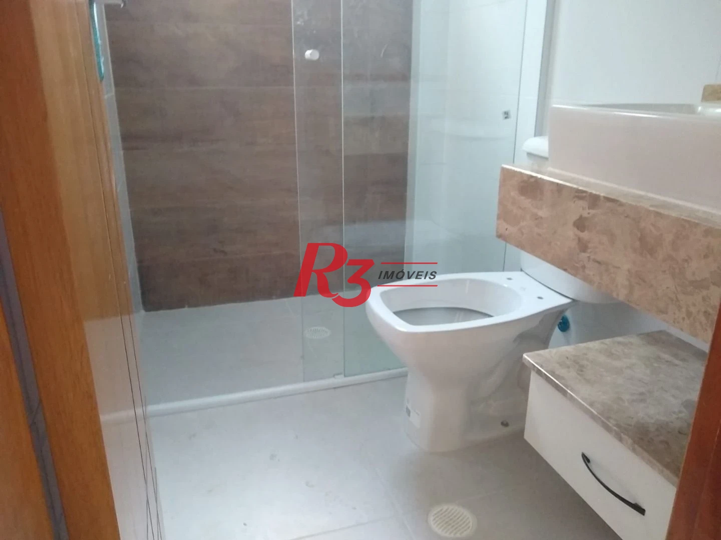 Sobrado com 3 dormitórios à venda, 100 m² por R$ 1.050.000,00 - Embaré - Santos/SP