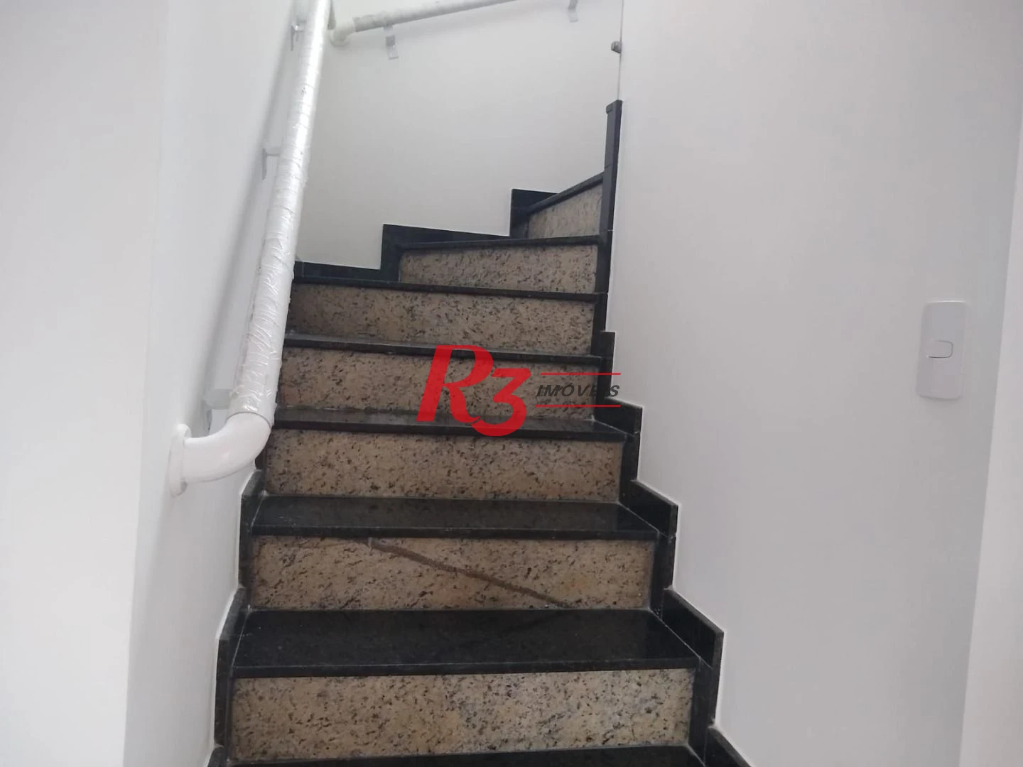 Sobrado com 3 dormitórios à venda, 100 m² por R$ 1.050.000,00 - Embaré - Santos/SP