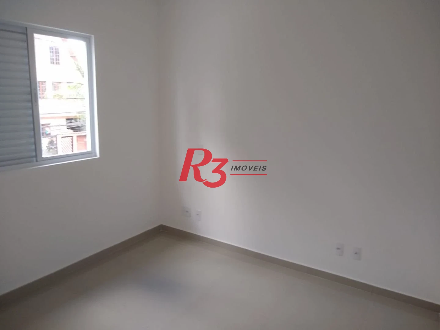 Sobrado com 3 dormitórios à venda, 100 m² por R$ 1.050.000,00 - Embaré - Santos/SP
