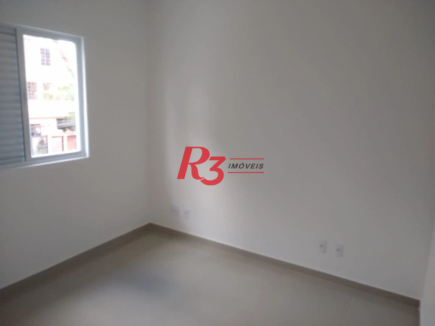 Sobrado com 3 dormitórios à venda, 100 m² por R$ 1.050.000,00 - Embaré - Santos/SP
