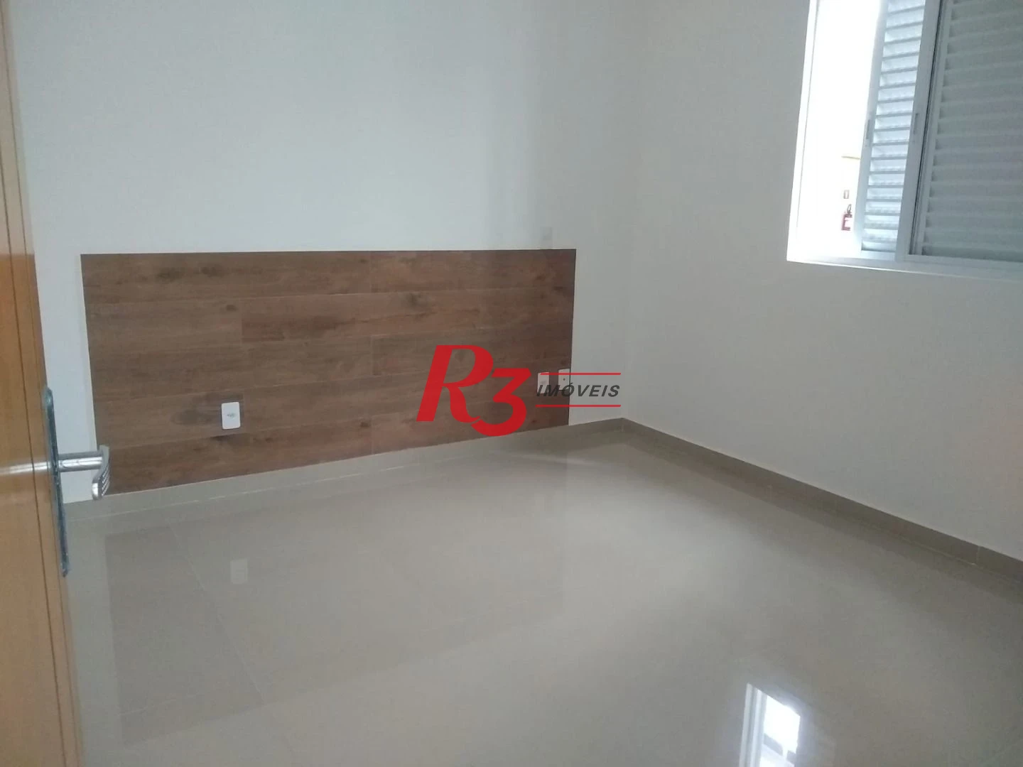 Sobrado com 3 dormitórios à venda, 100 m² por R$ 1.050.000,00 - Embaré - Santos/SP