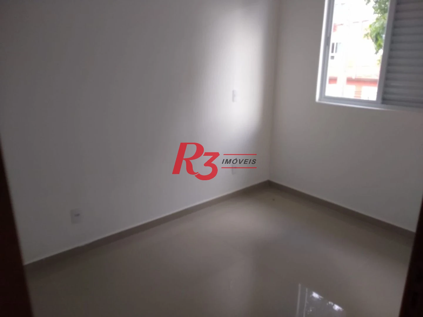 Sobrado com 3 dormitórios à venda, 100 m² por R$ 1.050.000,00 - Embaré - Santos/SP