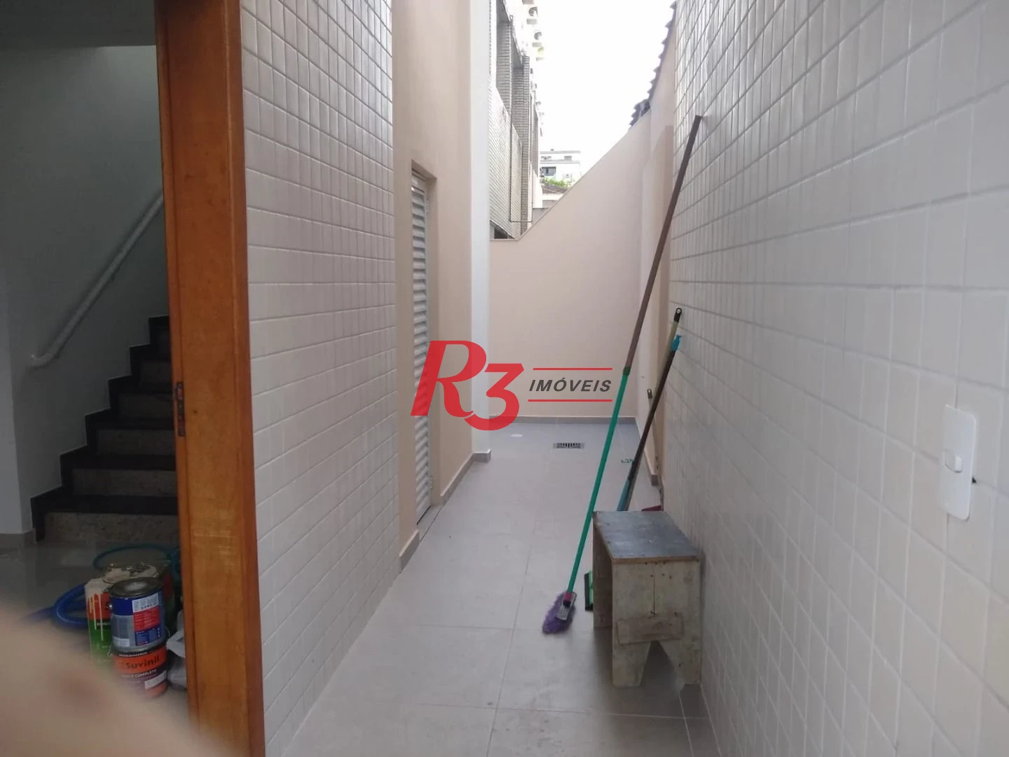 Sobrado com 3 dormitórios à venda, 100 m² por R$ 1.050.000,00 - Embaré - Santos/SP