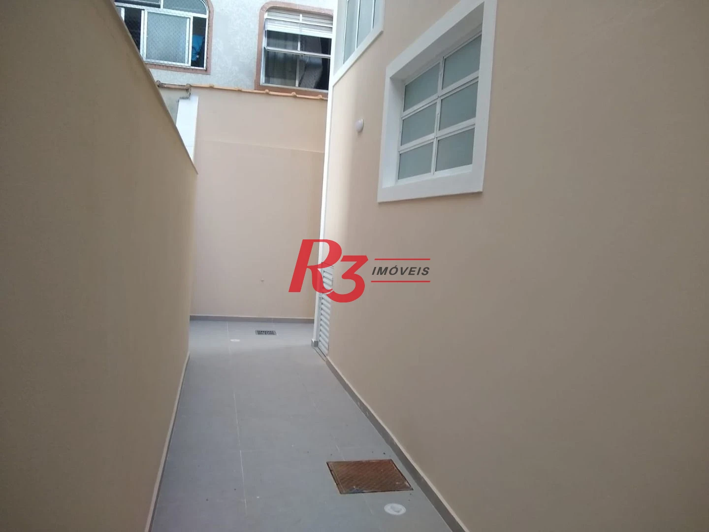 Sobrado com 3 dormitórios à venda, 100 m² por R$ 1.050.000,00 - Embaré - Santos/SP