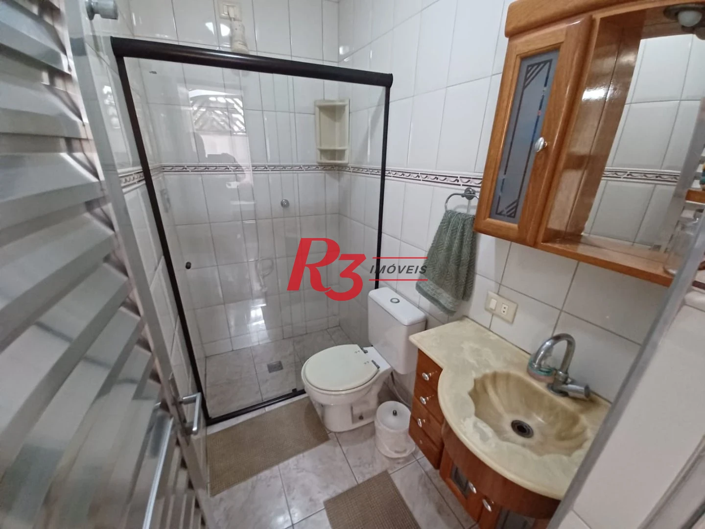 Casa com 3 dormitórios à venda, 157 m² por R$ 945.000,00 - Encruzilhada - Santos/SP