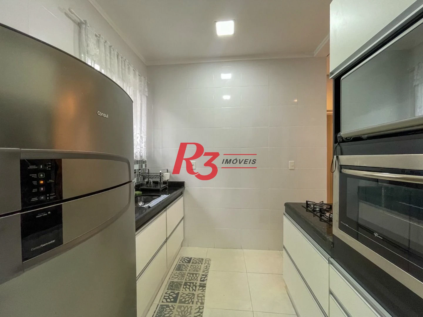 Sobrado à venda, 73 m² por R$ 564.000,00 - Boqueirão - Santos/SP