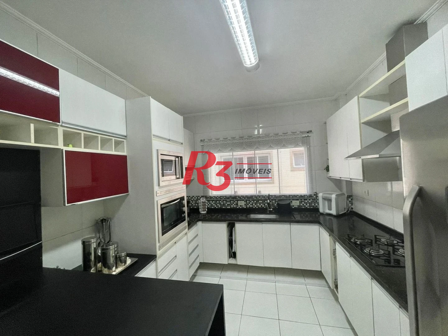 Casa com 3 dormitórios à venda, 130 m² por R$ 1.400.000,00 - Embaré - Santos/SP