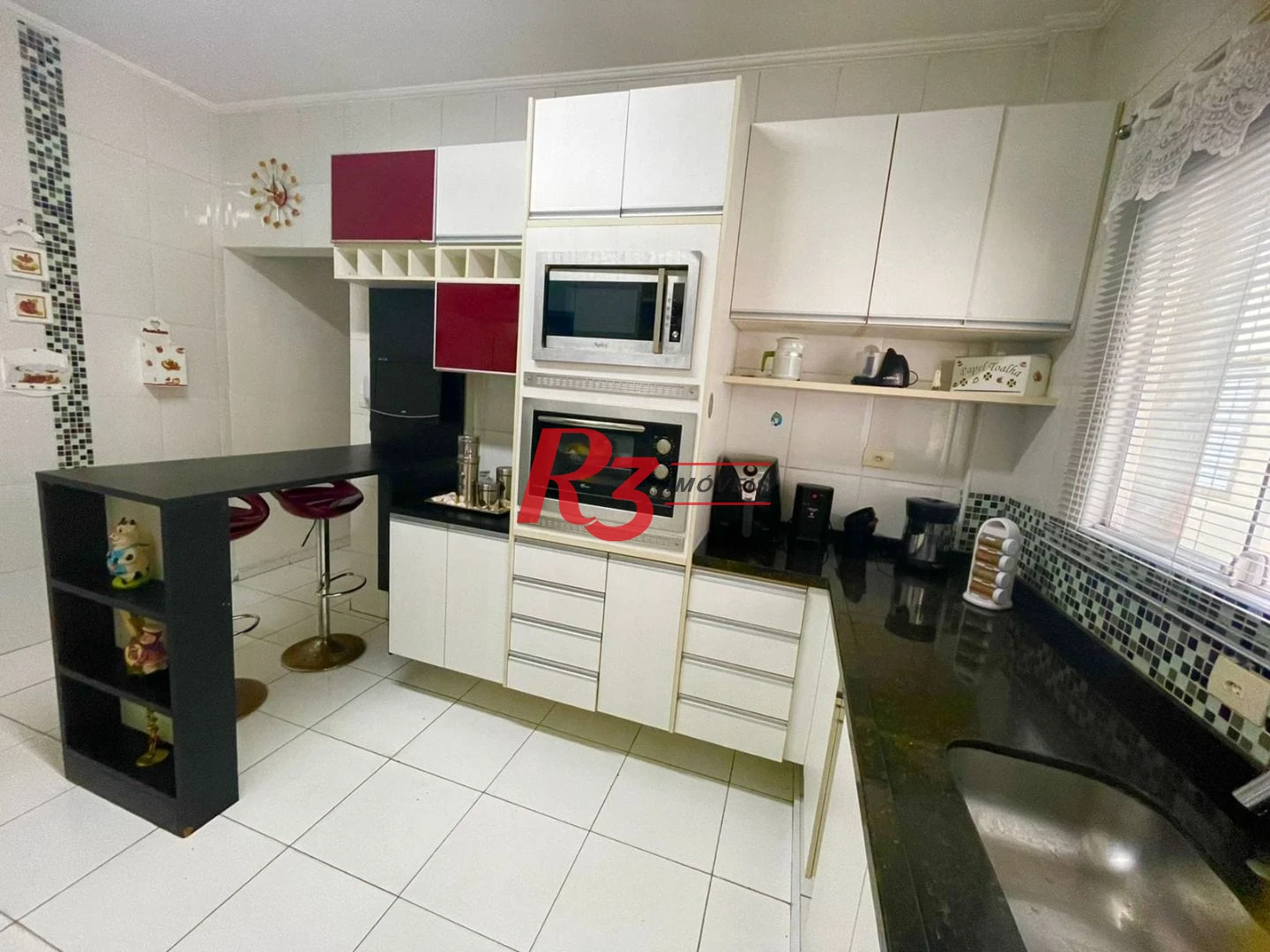 Casa com 3 dormitórios à venda, 130 m² por R$ 1.400.000,00 - Embaré - Santos/SP