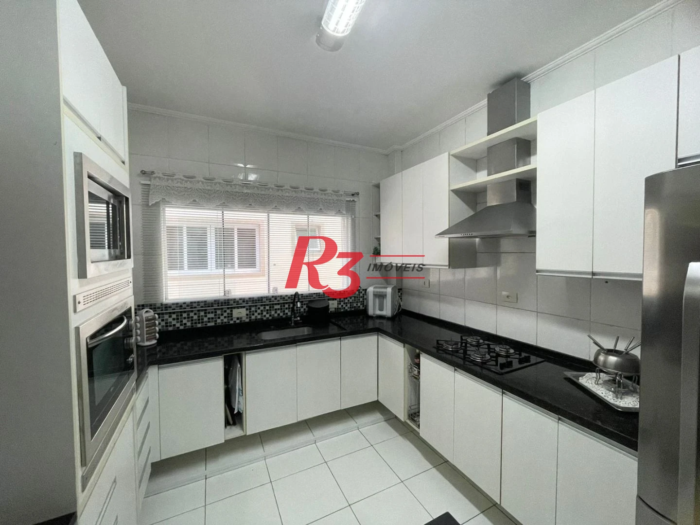 Casa com 3 dormitórios à venda, 130 m² por R$ 1.400.000,00 - Embaré - Santos/SP