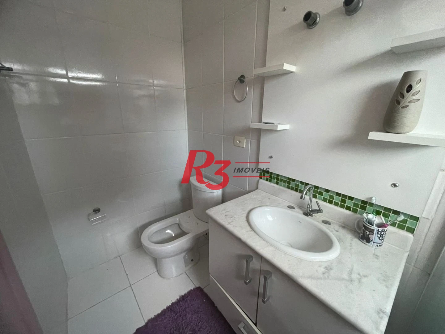 Casa com 3 dormitórios à venda, 130 m² por R$ 1.400.000,00 - Embaré - Santos/SP