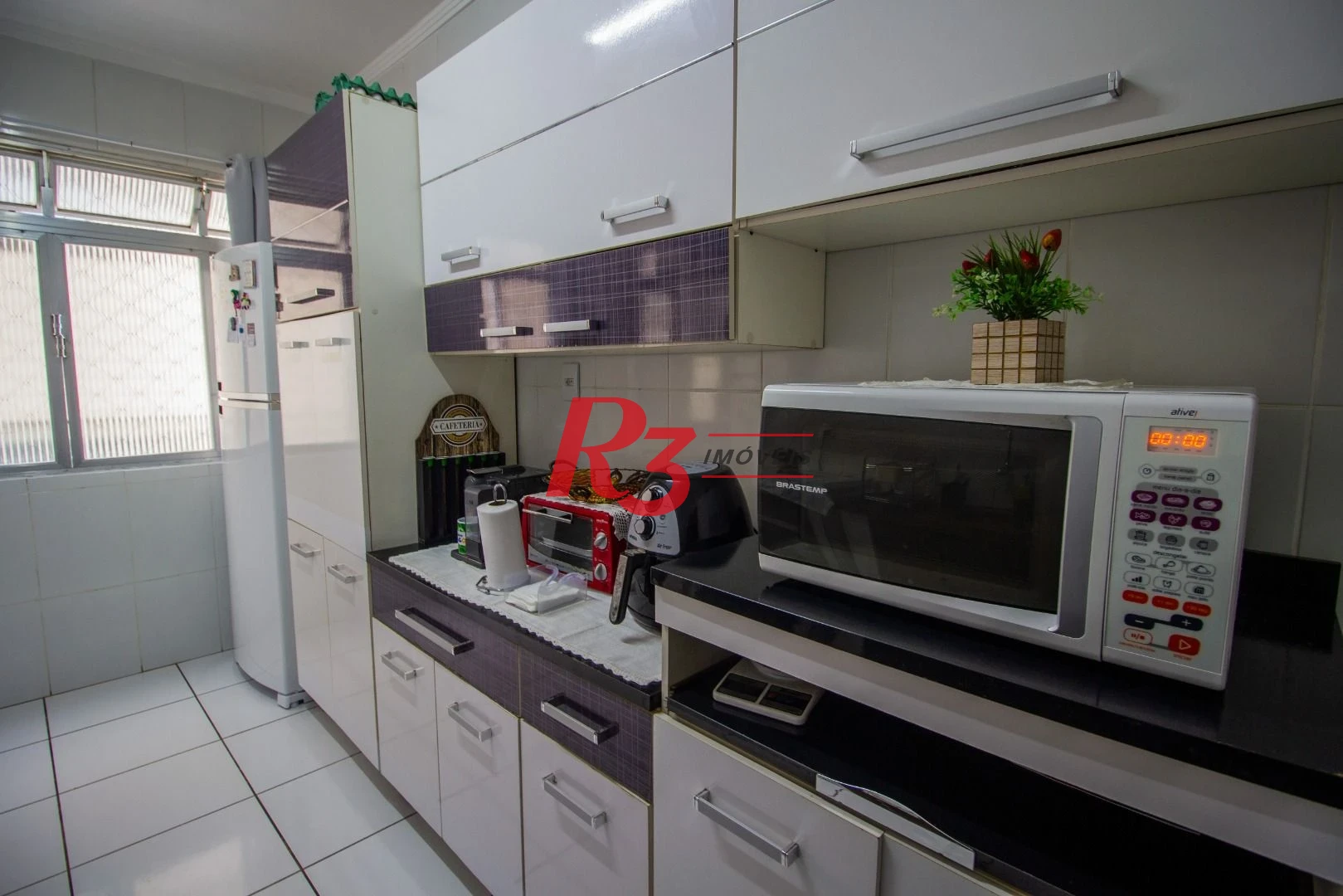 Apartamento com 2 dormitórios à venda, 98 m² por R$ 510.000,00 - Gonzaga - Santos/SP
