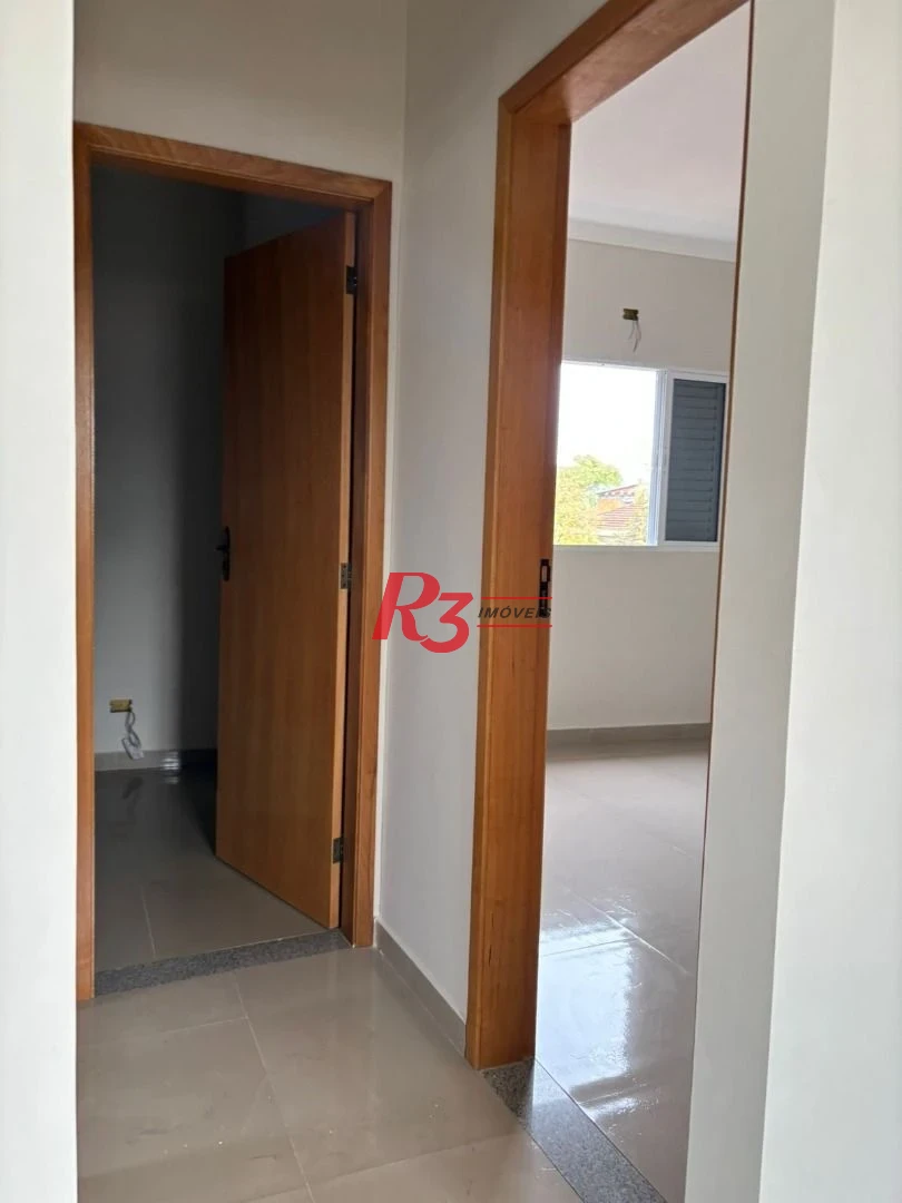 Casa com 2 dormitórios à venda, 80 m² por R$ 375.000,00 - Areia Branca - Santos/SP