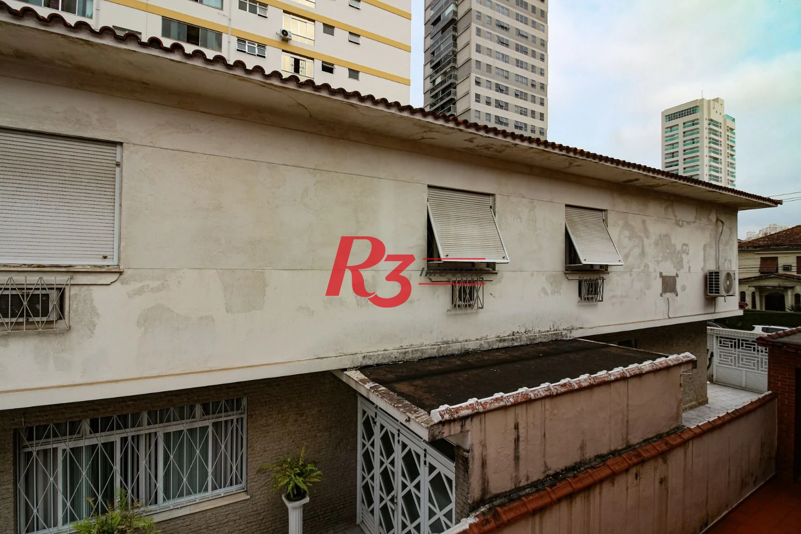 Sobrado com 4 dormitórios, 325 m² - venda por R$ 2.500.000,00 ou aluguel por R$ 8.000,00/mês - Embaré - Santos/SP