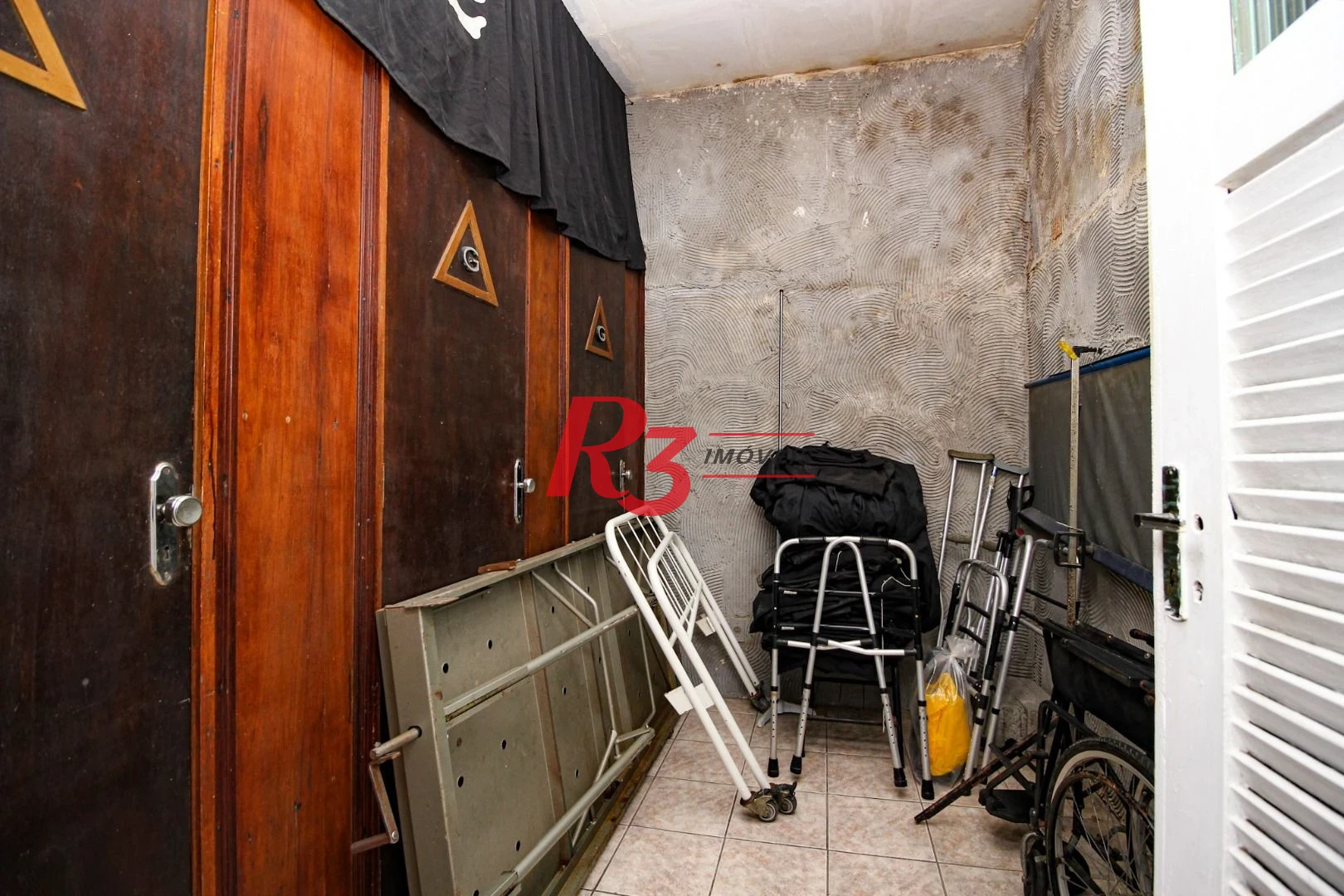 Sobrado com 3 dormitórios à venda, 248 m² por R$ 700.000,00 - Vila Matias - Santos/SP