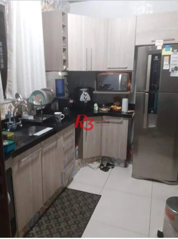 Casa com 3 dormitórios à venda, 265 m² por R$ 744.000,00 - Chico de Paula - Santos/SP