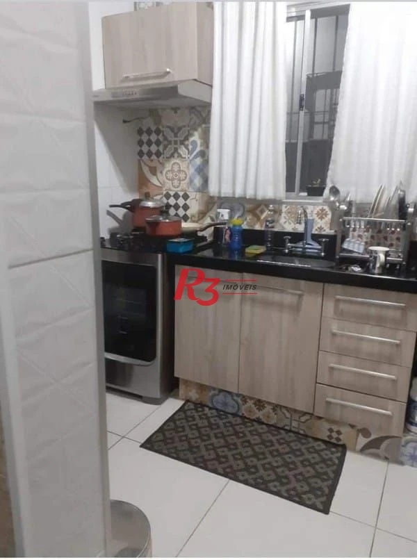 Casa com 3 dormitórios à venda, 265 m² por R$ 744.000,00 - Chico de Paula - Santos/SP