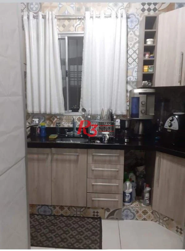Casa com 3 dormitórios à venda, 265 m² por R$ 744.000,00 - Chico de Paula - Santos/SP