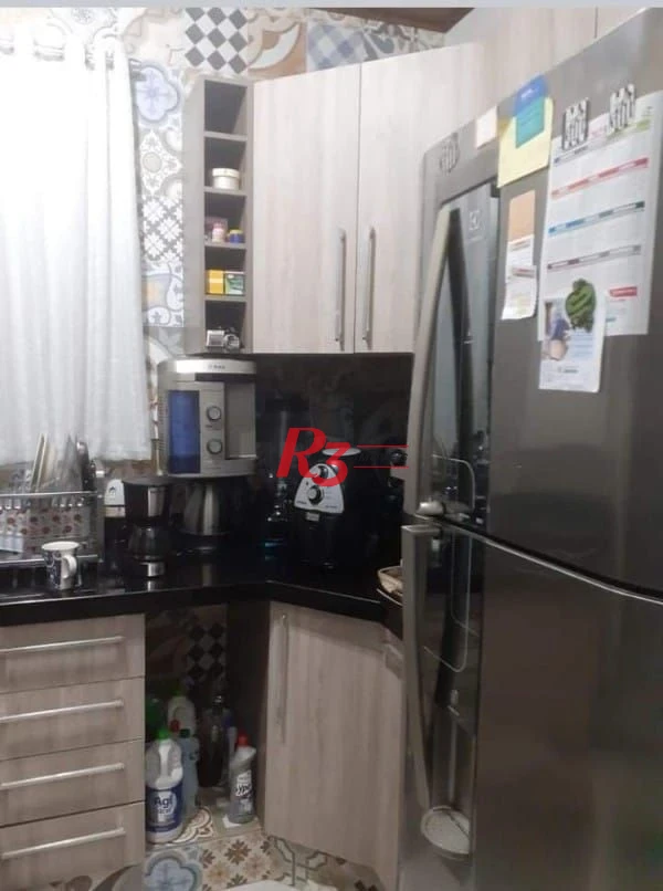 Casa com 3 dormitórios à venda, 265 m² por R$ 744.000,00 - Chico de Paula - Santos/SP