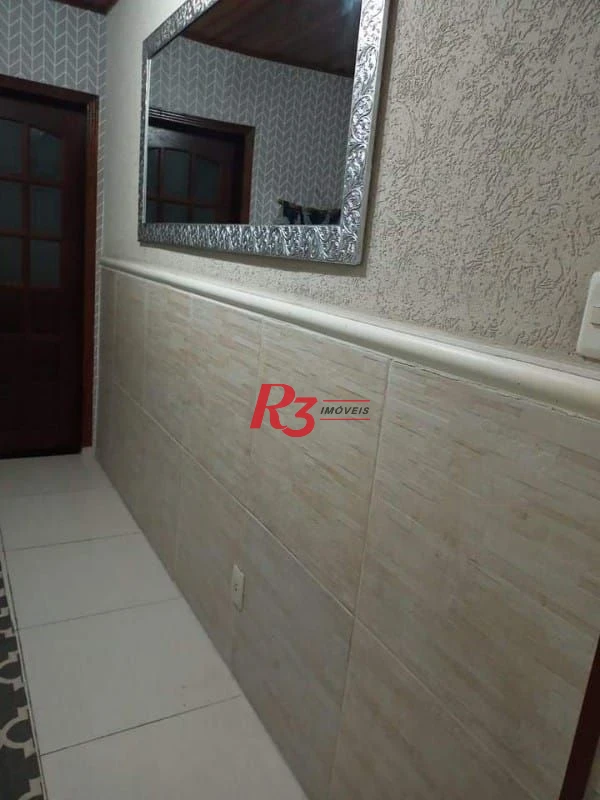 Casa com 3 dormitórios à venda, 265 m² por R$ 744.000,00 - Chico de Paula - Santos/SP