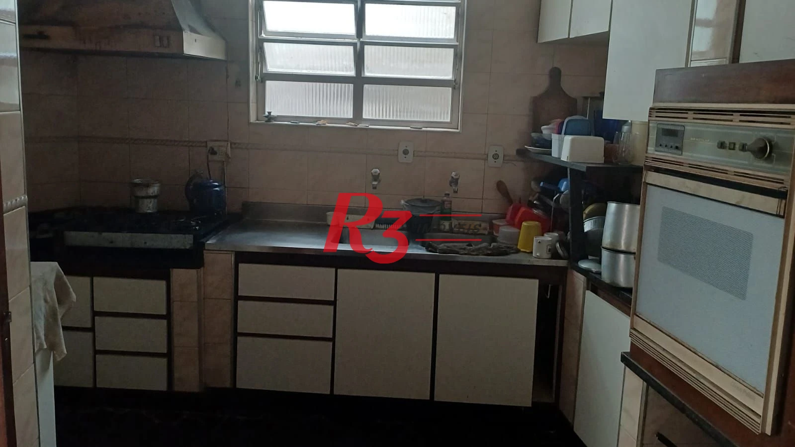 Casa à venda, 103 m² por R$ 1.070.000,00 - Ponta da Praia - Santos/SP