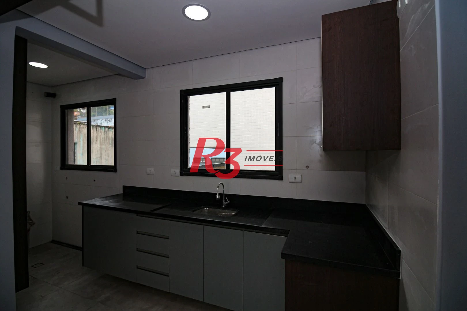 Sobrado com 2 dormitórios, 98 m² - venda por R$ 690.000,00 ou aluguel por R$ 5.500,00/mês - Marapé - Santos/SP