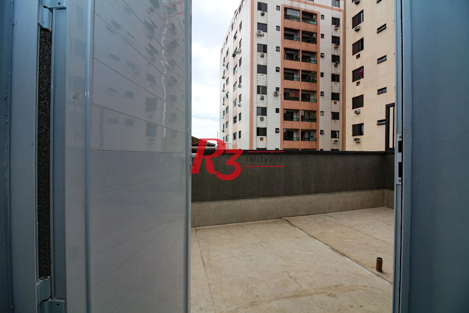 Sobrado com 2 dormitórios, 98 m² - venda por R$ 690.000,00 ou aluguel por R$ 5.500,00/mês - Marapé - Santos/SP