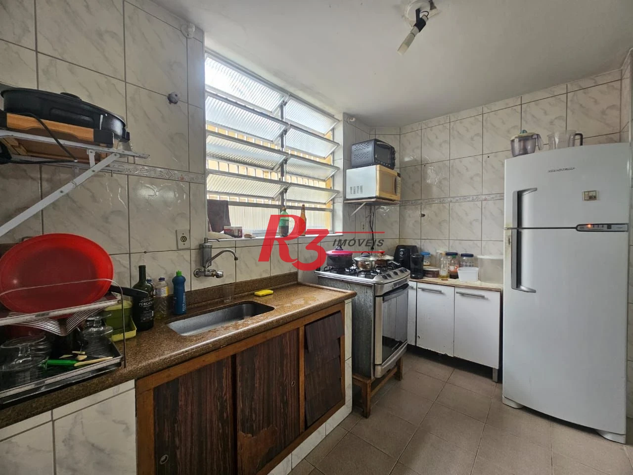 Sobrado com 2 dormitórios à venda, 98 m² por R$ 650.000,00 - Campo Grande - Santos/SP