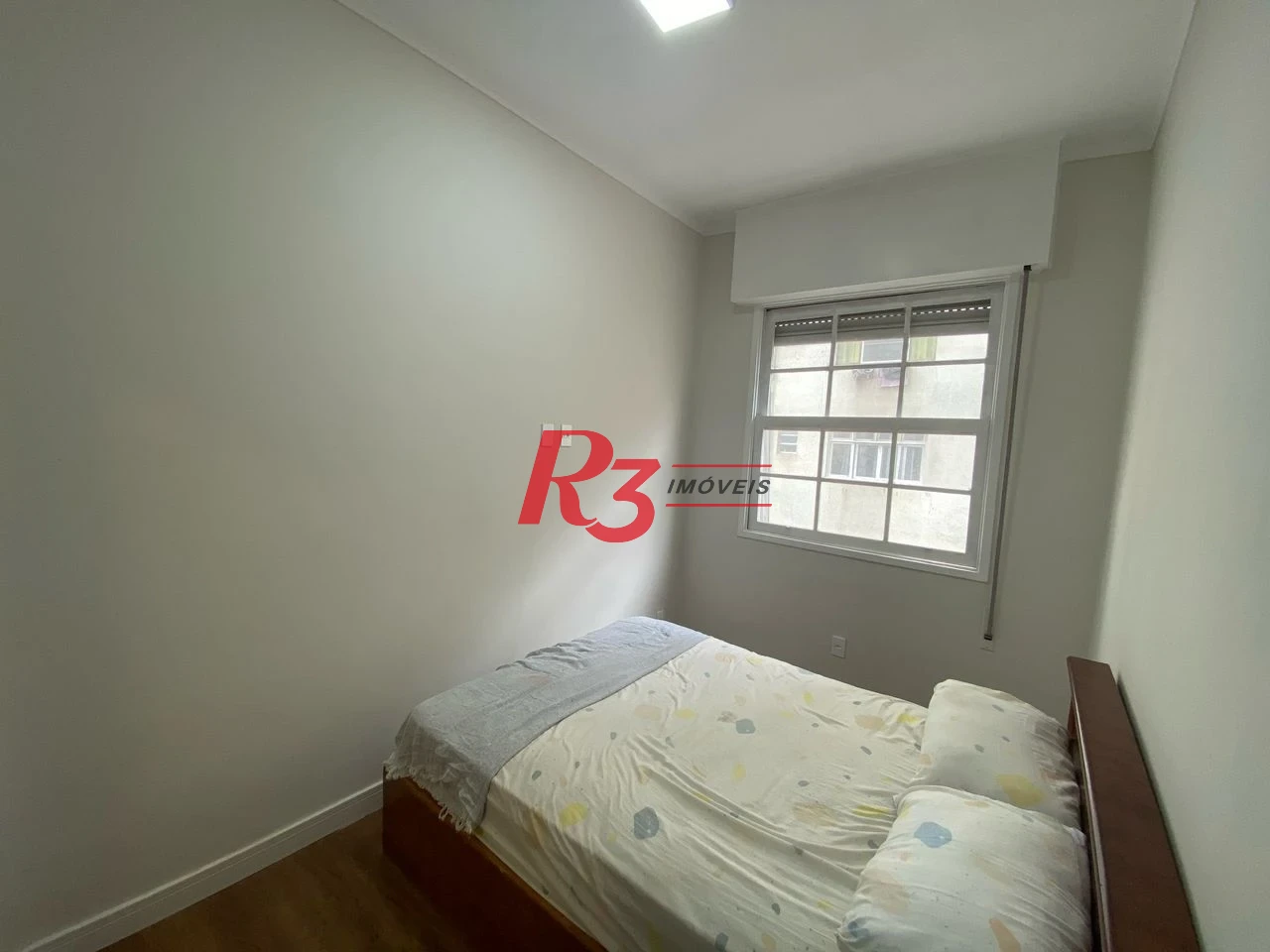 Apartamento com 2 dormitórios à venda, 55 m² por R$ 400.000,00 - Embaré - Santos/SP