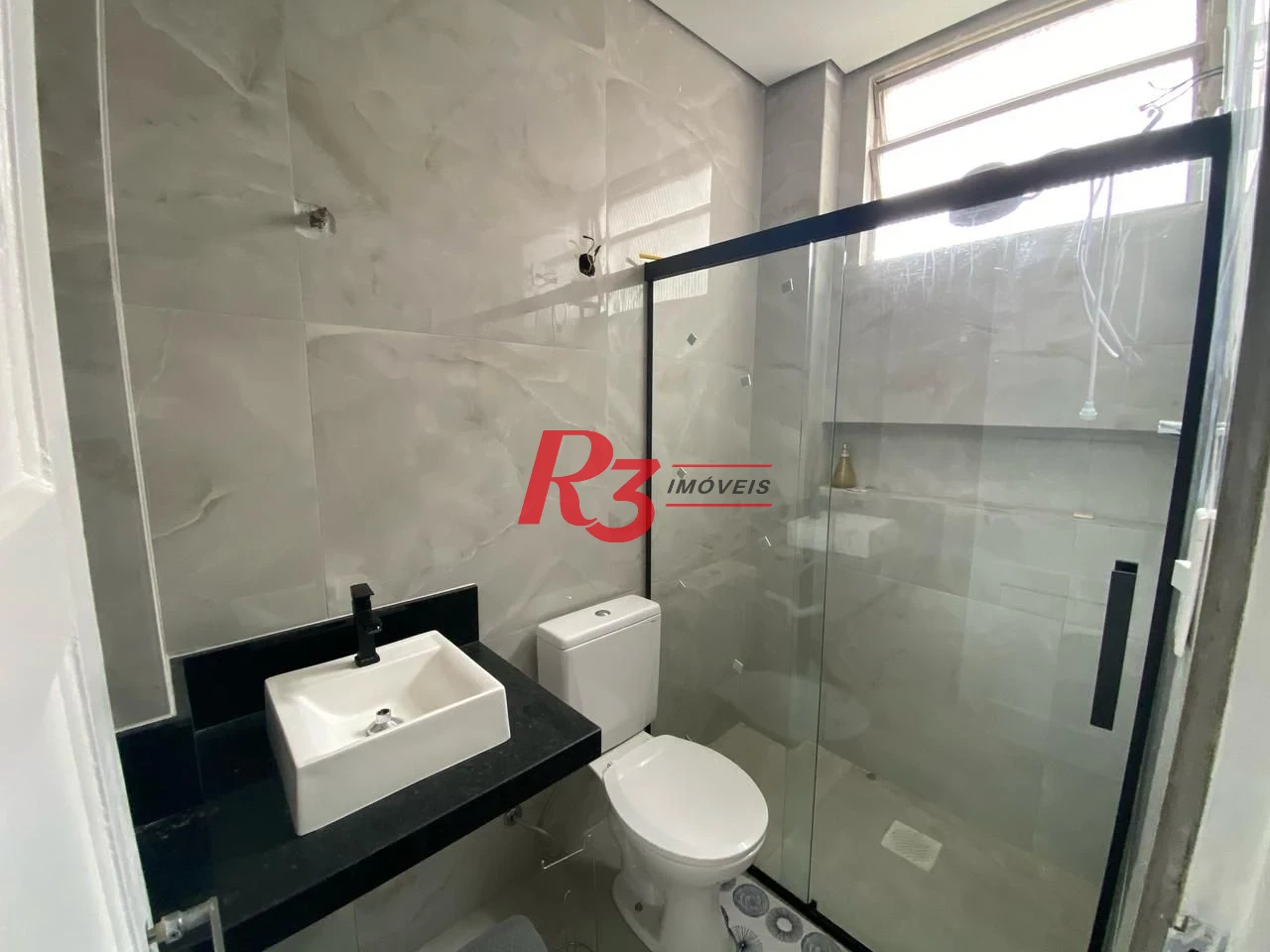 Apartamento com 2 dormitórios à venda, 55 m² por R$ 400.000,00 - Embaré - Santos/SP