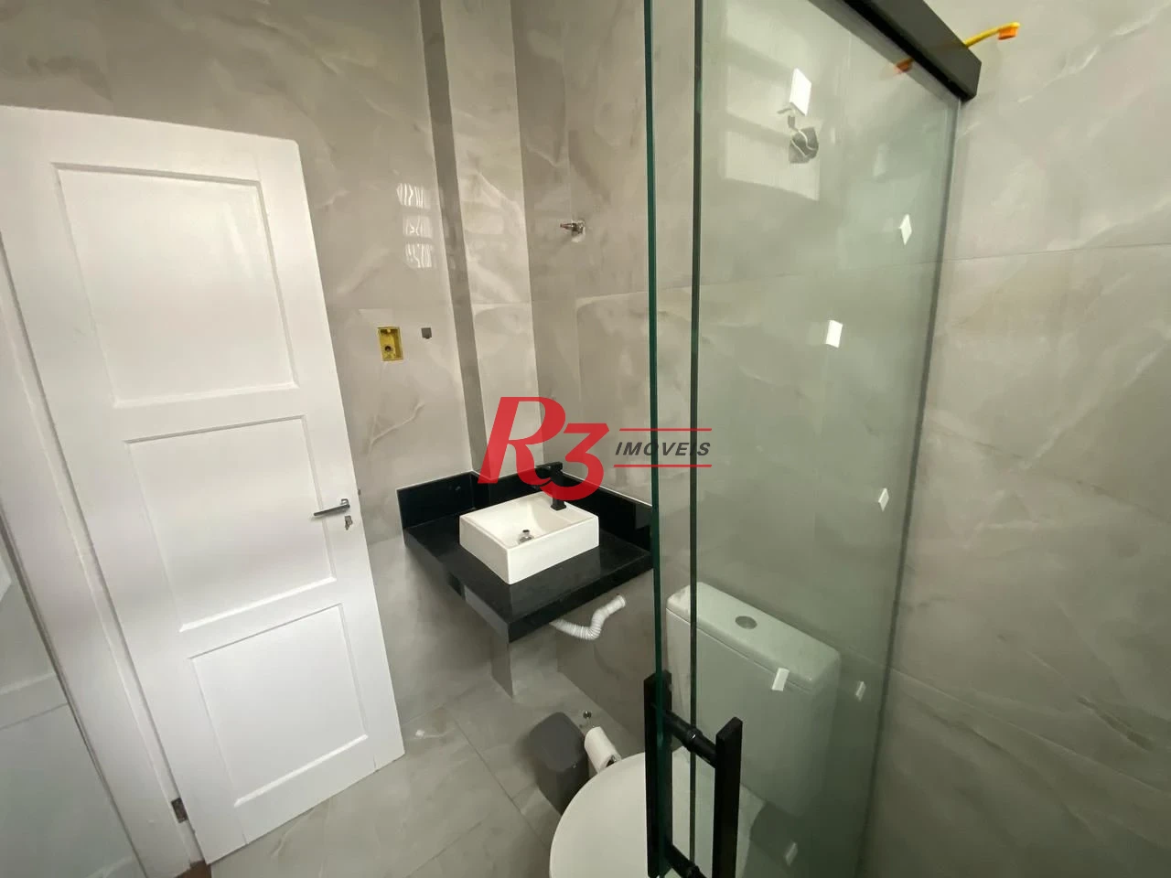 Apartamento com 2 dormitórios à venda, 55 m² por R$ 400.000,00 - Embaré - Santos/SP