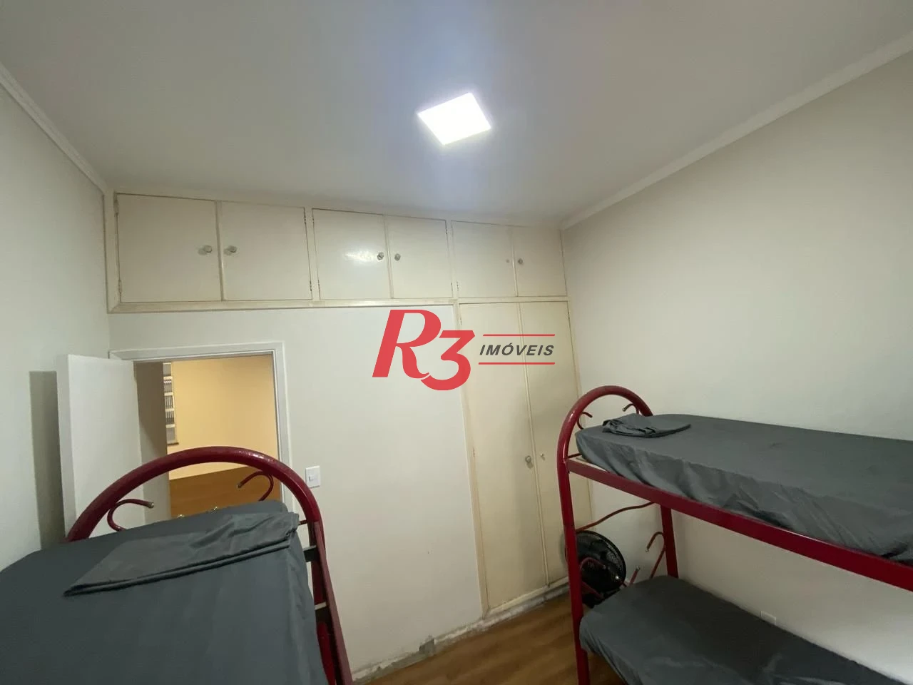 Apartamento com 2 dormitórios à venda, 55 m² por R$ 400.000,00 - Embaré - Santos/SP