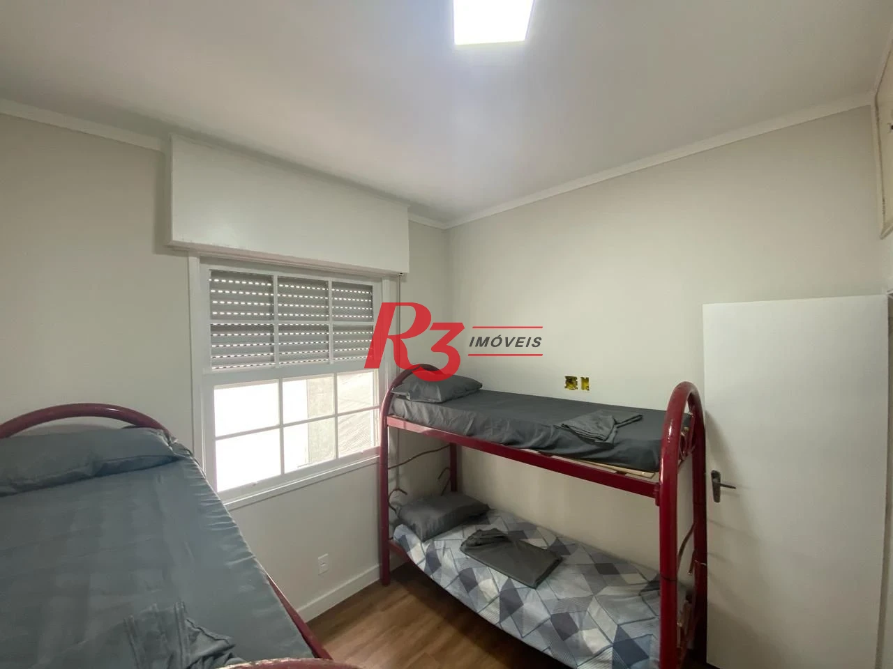 Apartamento com 2 dormitórios à venda, 55 m² por R$ 400.000,00 - Embaré - Santos/SP