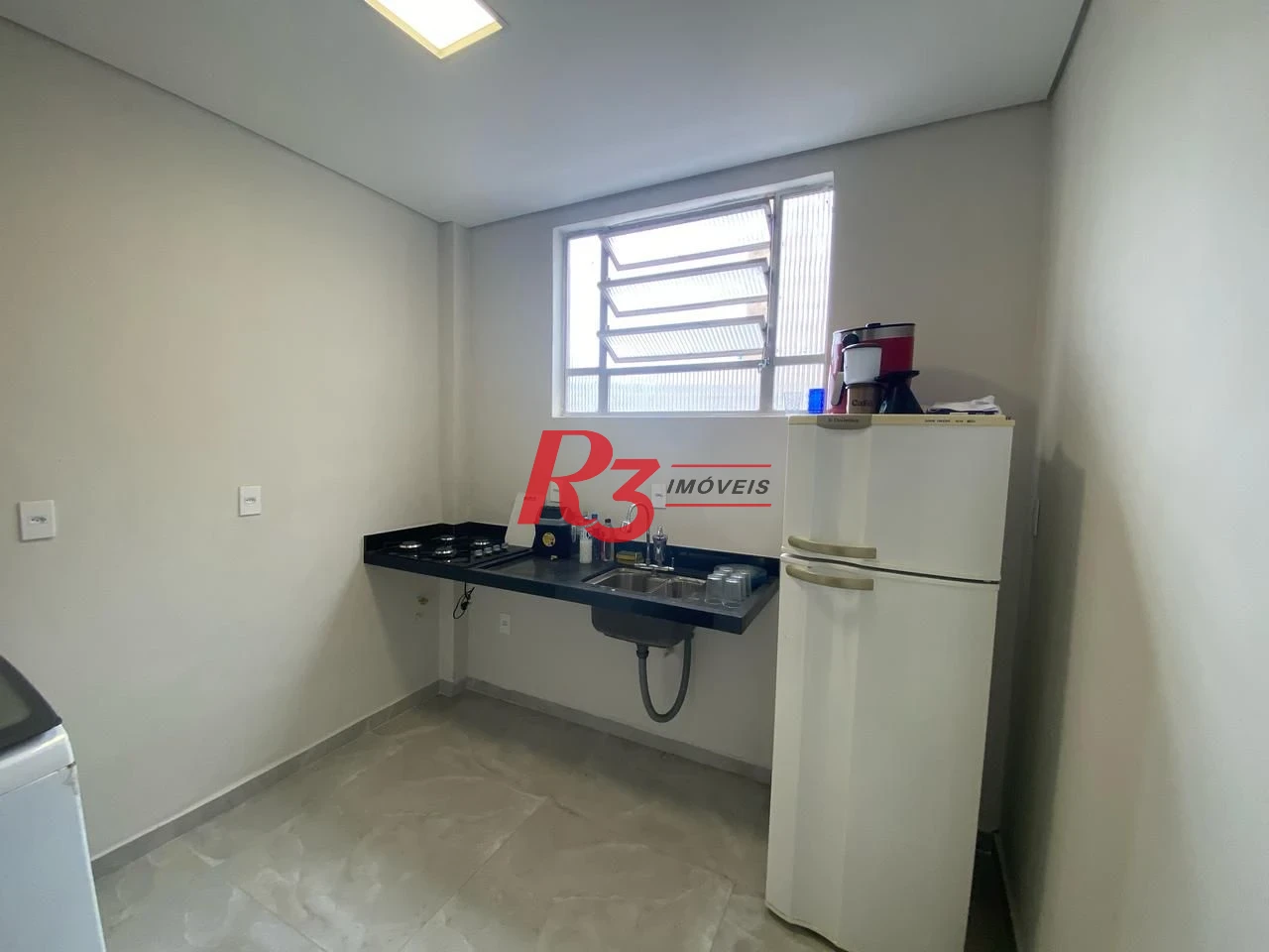 Apartamento com 2 dormitórios à venda, 55 m² por R$ 400.000,00 - Embaré - Santos/SP
