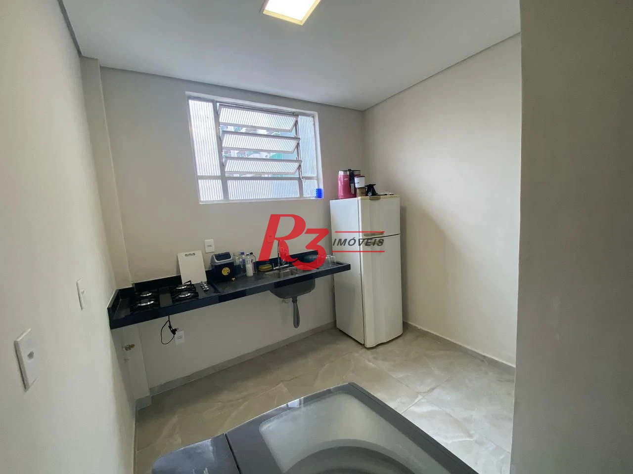 Apartamento com 2 dormitórios à venda, 55 m² por R$ 400.000,00 - Embaré - Santos/SP