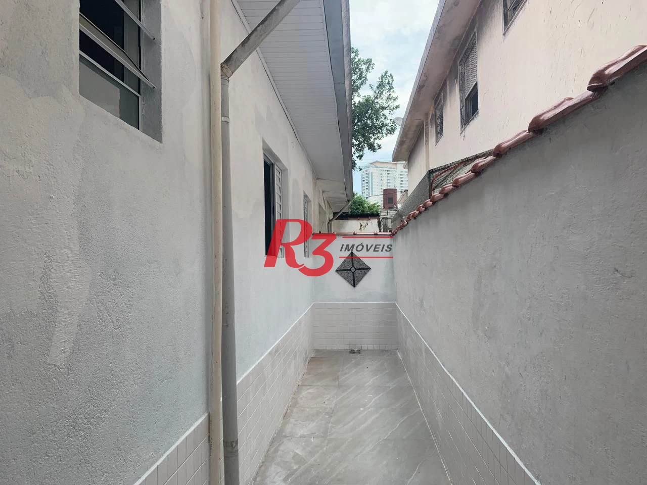 Casa com 2 dormitórios para alugar, 100 m² por R$ 4.100,00/mês - Embaré - Santos/SP