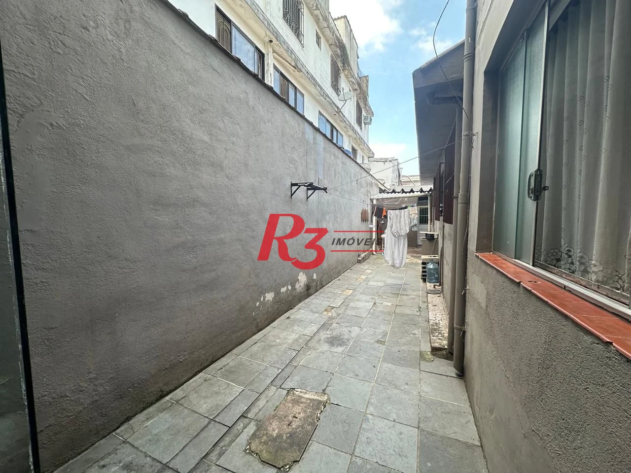 Casa com 6 dormitórios, 223 m² - venda por R$ 900.000,00 ou aluguel por R$ 8.000,01/mês - Vila Matias - Santos/SP