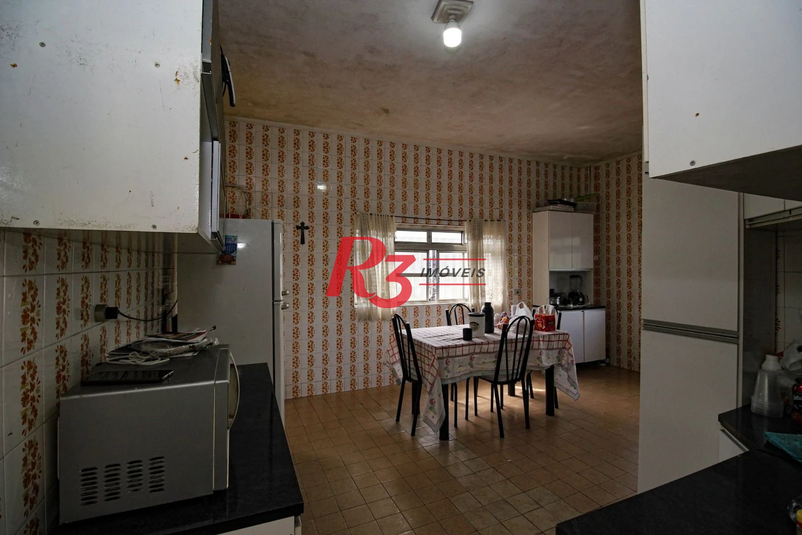 Casa com 3 dormitórios à venda, 150 m² por R$ 550.000,00 - Santa Maria - Santos/SP