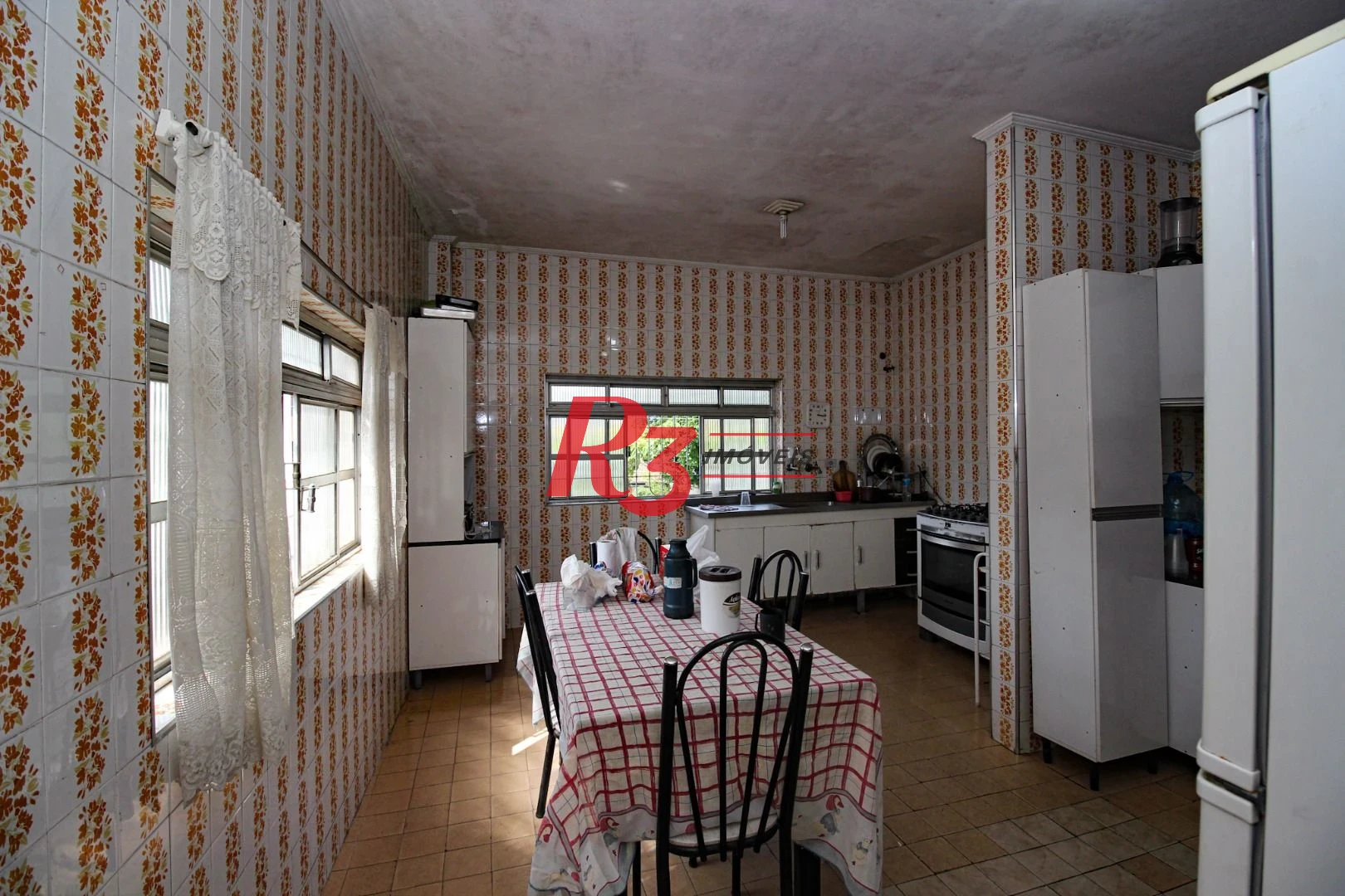 Casa com 3 dormitórios à venda, 150 m² por R$ 550.000,00 - Santa Maria - Santos/SP