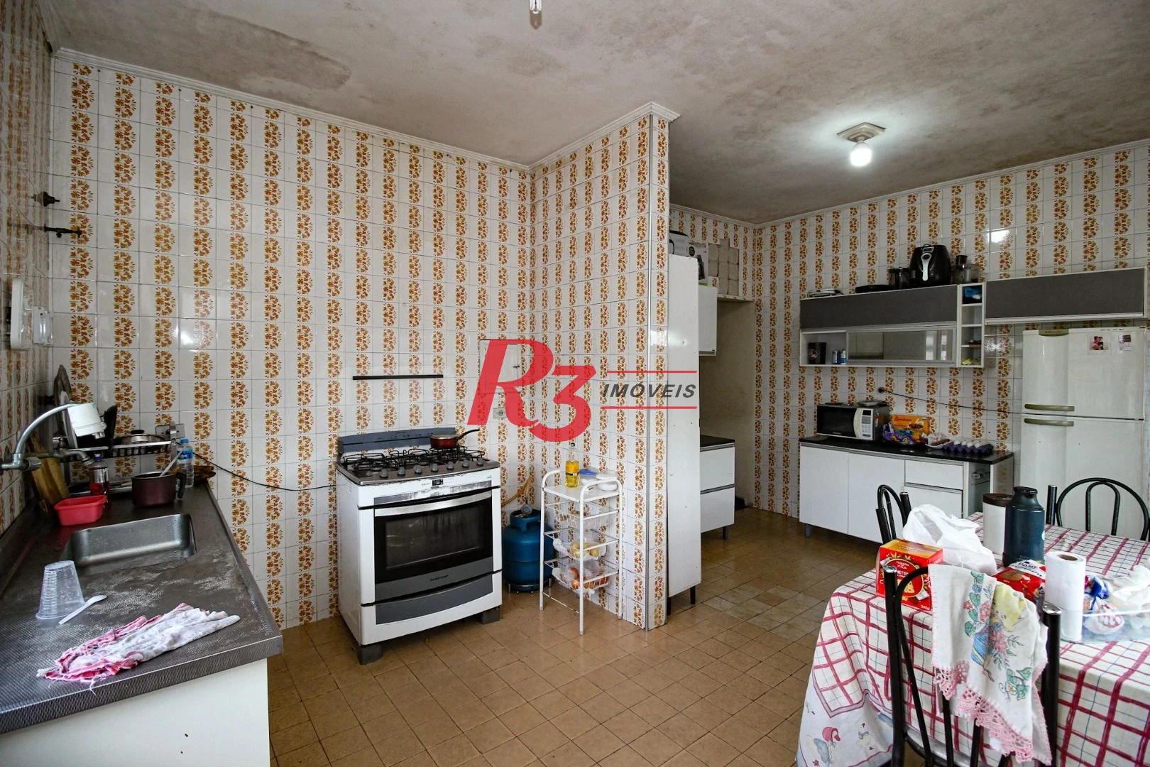 Casa com 3 dormitórios à venda, 150 m² por R$ 550.000,00 - Santa Maria - Santos/SP