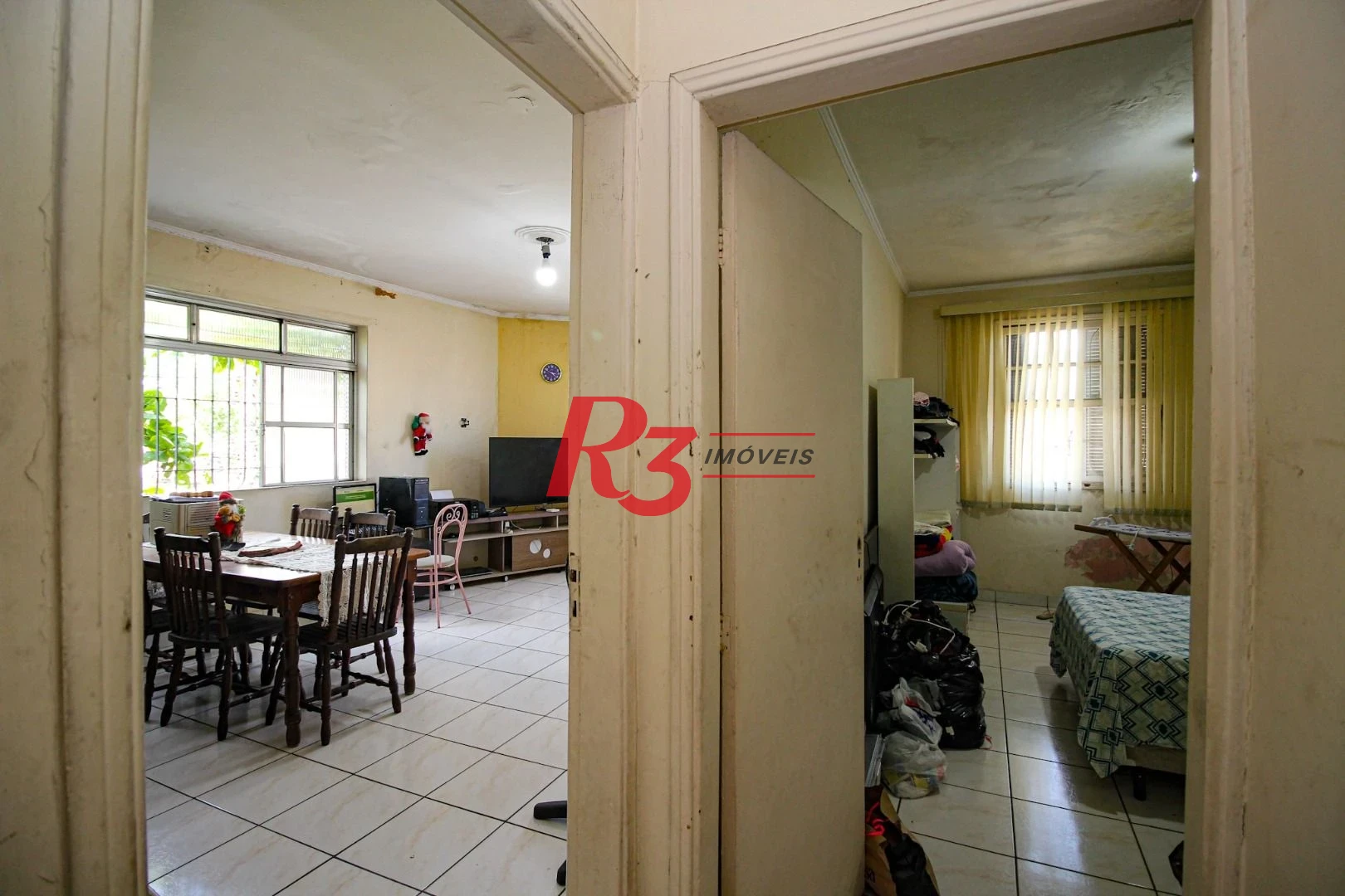Casa com 3 dormitórios à venda, 150 m² por R$ 550.000,00 - Santa Maria - Santos/SP