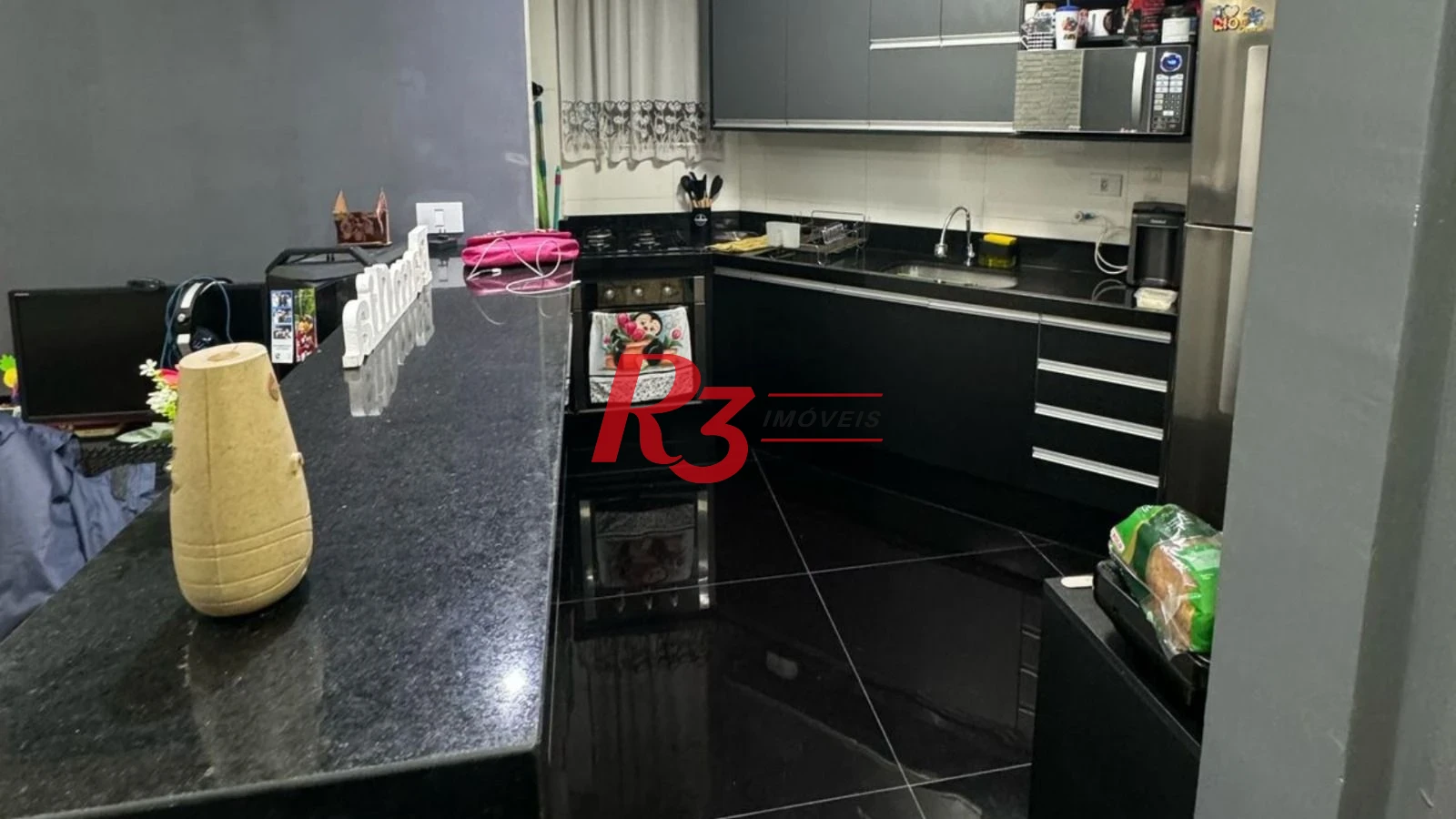 Apartamento à venda, 70 m² por R$ 300.000,00 - Saboó - Santos/SP