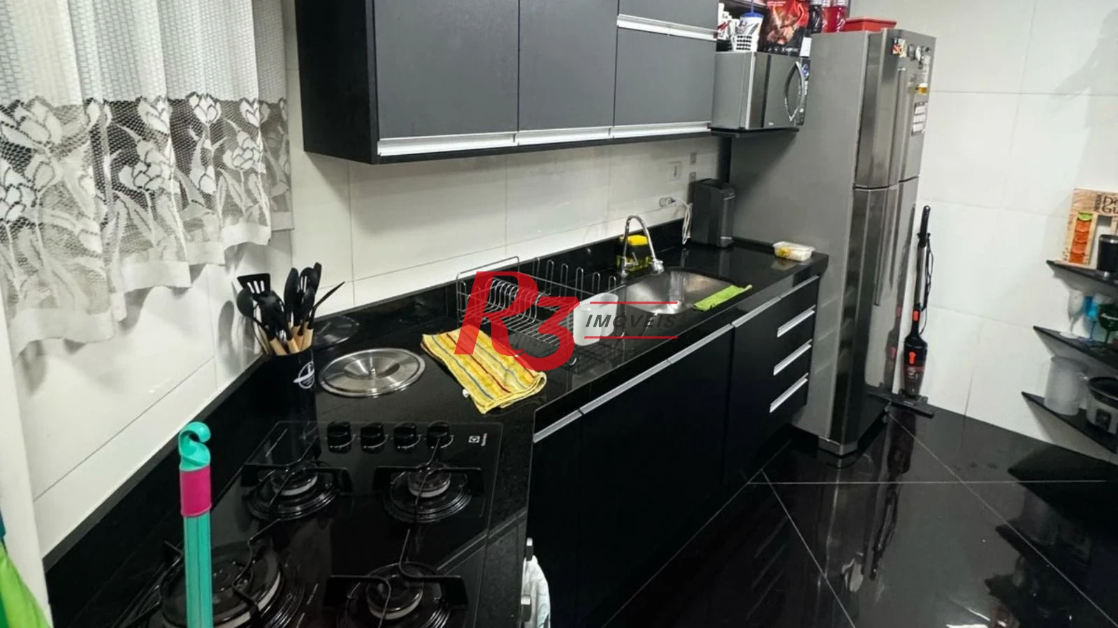 Apartamento à venda, 70 m² por R$ 300.000,00 - Saboó - Santos/SP