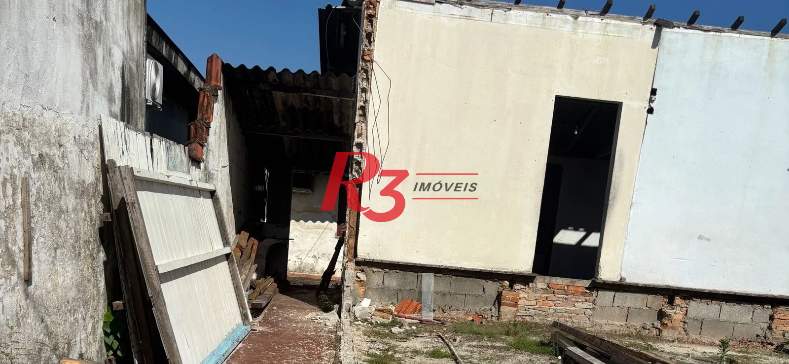 Terreno à venda, 196 m² por R$ 300.000,00 - Areia Branca - Santos/SP