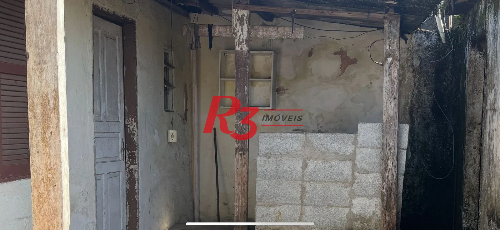 Terreno à venda, 196 m² por R$ 300.000,00 - Areia Branca - Santos/SP